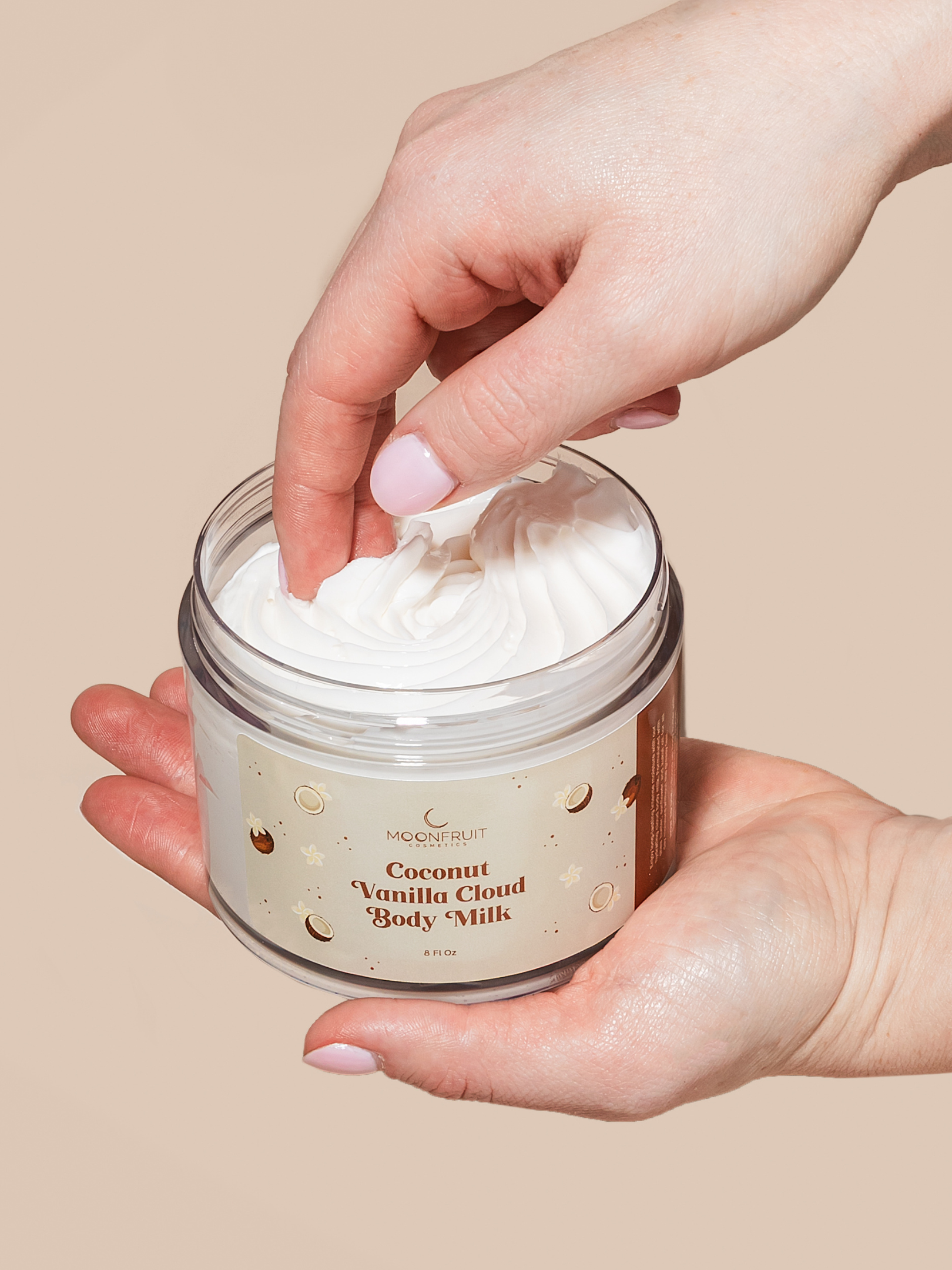 Coconut Vanilla Cloud moisturizer –  a luxurious, hydrating  non-greasy body butter enriched with shea butter, sunflower oil, and apple extract. This 8 oz jar showcases a whipped, creamy texture designed to deeply hydrate and soften dry skin, leaving it feeling replenished and smooth.